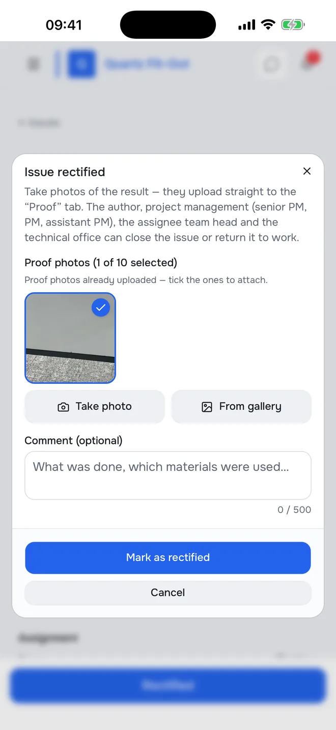 The “Issue rectified” window on a phone: a photo of the result and the button that marks the issue rectified